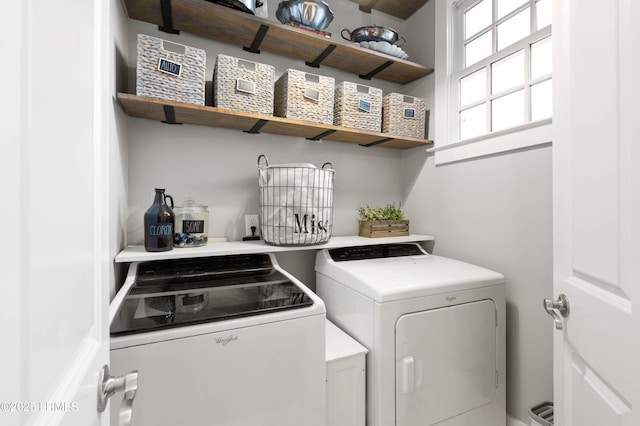 laundry room featuring laundry area and separate washer and dryer