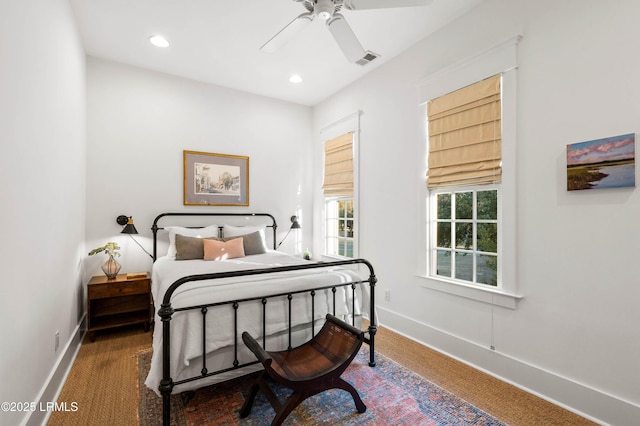 carpeted bedroom with recessed lighting, visible vents, ceiling fan, and baseboards