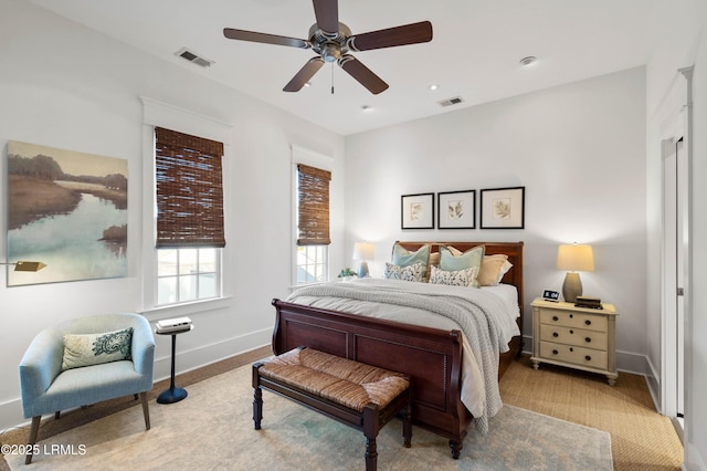 bedroom featuring recessed lighting, visible vents, ceiling fan, and baseboards