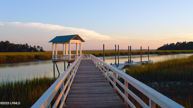 view of dock with a water view