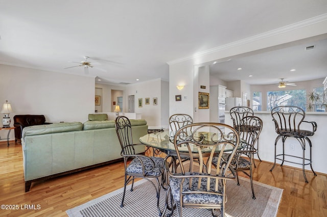 dining area featuring recessed lighting, light wood-style floors, ceiling fan, and crown molding