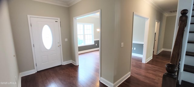 entryway with baseboards, stairs, crown molding, and dark wood-type flooring