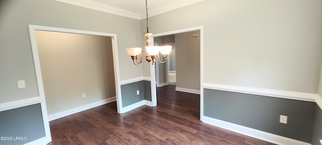 unfurnished dining area with a notable chandelier, ornamental molding, baseboards, and dark wood-style flooring