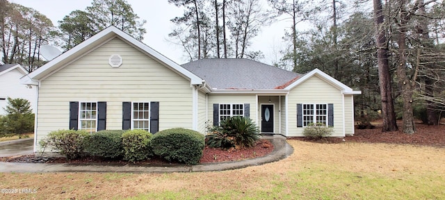 ranch-style house with a front yard