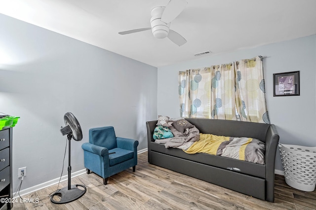 bedroom featuring light wood-type flooring and ceiling fan