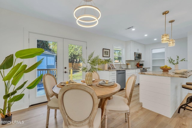 3001 N St, Beaufort, SC 29902 - dining room featuring a chandelier, light wood-type flooring, and recessed lighting