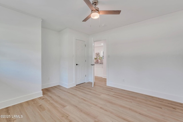 3001 N St, Beaufort, SC 29902 - empty room featuring baseboards, ornamental molding, light wood finished floors, and ceiling fan
