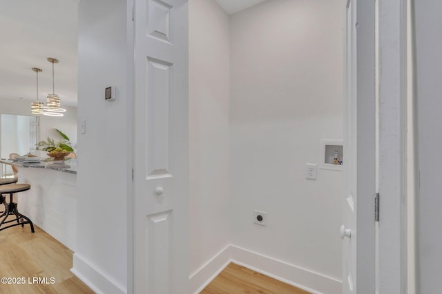 3001 N St, Beaufort, SC 29902 - laundry area featuring washer hookup, hookup for an electric dryer, light wood-style floors, and baseboards