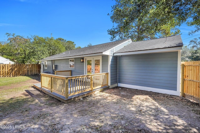 3001 N St, Beaufort, SC 29902 - back of property featuring french doors, a deck, a fenced backyard, and a shingled roof