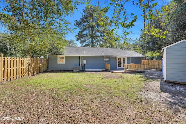 3001 N St, Beaufort, SC 29902 - back of property with french doors, a wooden deck, central AC, a storage shed, and an outdoor structure