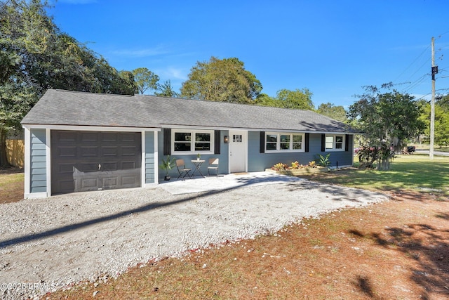 3001 N St, Beaufort, SC 29902 - ranch-style house featuring an attached garage, driveway, and roof with shingles