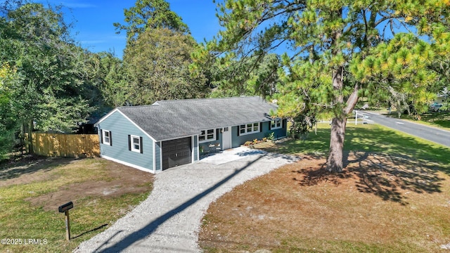 3001 N St, Beaufort, SC 29902 - ranch-style home with roof with shingles, an attached garage, and driveway
