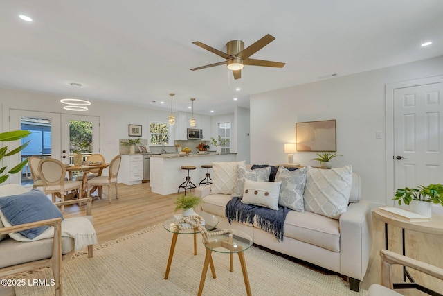 3001 N St, Beaufort, SC 29902 - living room featuring light wood-style floors, ceiling fan, and recessed lighting