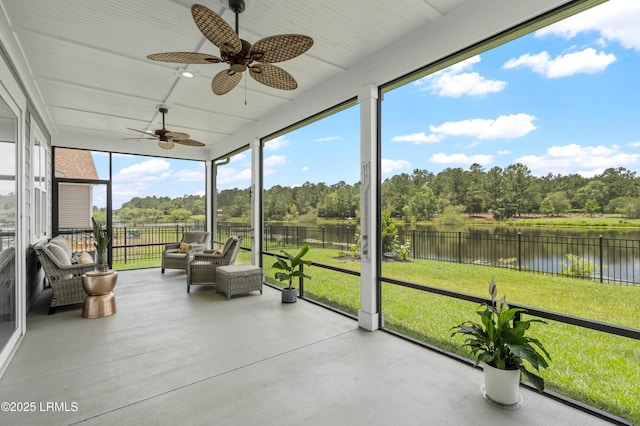 327 River Oak Way, Hardeeville, SC 29927 - sunroom featuring a water view, a ceiling fan, and view of wooded area