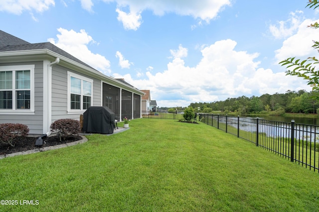 327 River Oak Way, Hardeeville, SC 29927 - fenced backyard with a sunroom and a water view