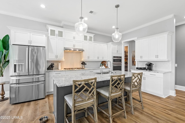 327 River Oak Way, Hardeeville, SC 29927 - kitchen featuring appliances with stainless steel finishes, under cabinet range hood, crown molding, recessed lighting, and backsplash
