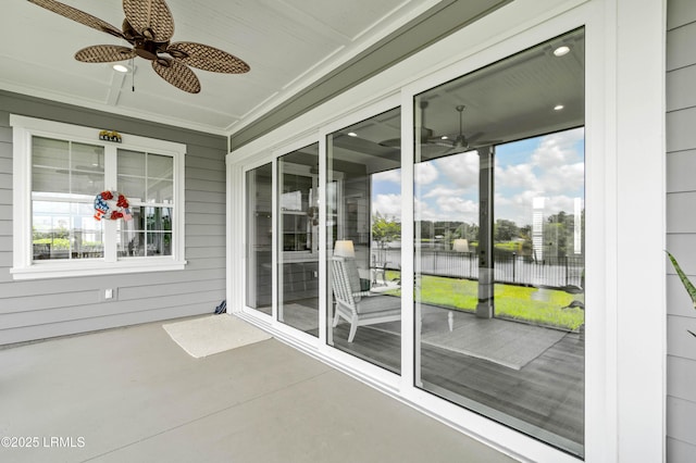 327 River Oak Way, Hardeeville, SC 29927 - unfurnished sunroom featuring ceiling fan and a water view