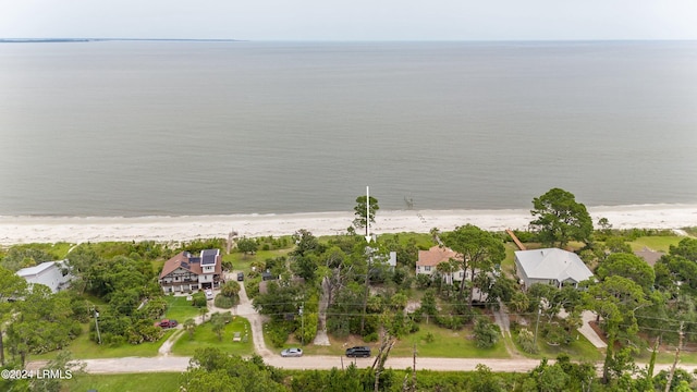 bird's eye view with a beach view and a water view