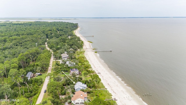 aerial view featuring a water view and a beach view