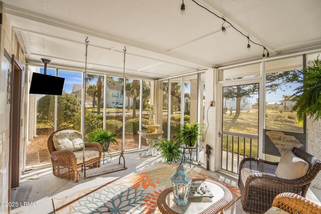 1 Scallop Ct, Harbor Island, SC 29920 - sunroom / solarium featuring expansive windows and healthy amount of natural light
