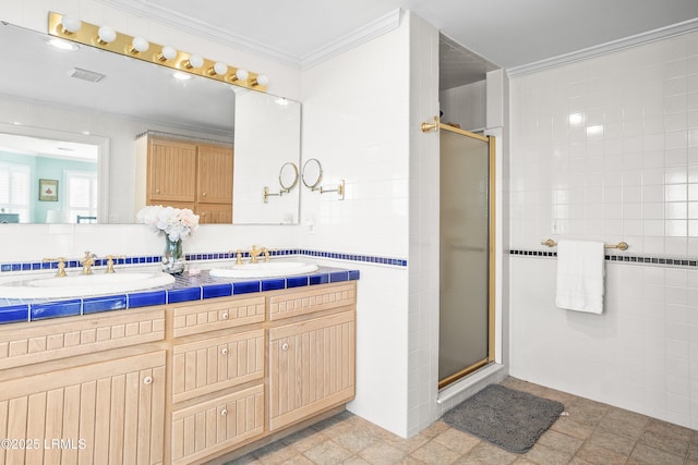 1 Scallop Ct, Harbor Island, SC 29920 - bathroom featuring a shower stall, crown molding, and double vanity