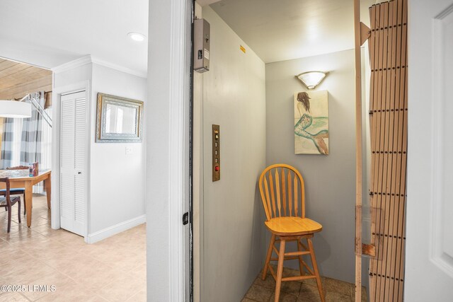 1 Scallop Ct, Harbor Island, SC 29920 - hallway with ornamental molding, baseboards, and elevator