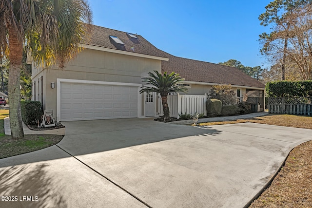 view of front of property featuring a garage