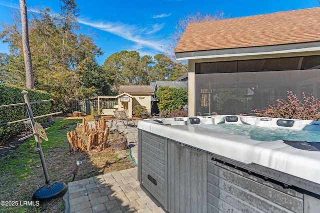 exterior space featuring a hot tub