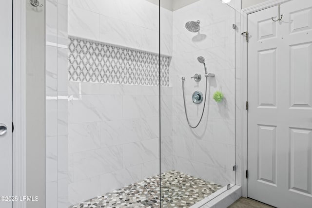 bathroom featuring tiled shower