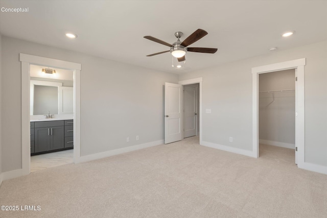 421 Parkside Commons, Bluffton, SC 29910 - unfurnished bedroom featuring light colored carpet, recessed lighting, a walk in closet, a closet, and ensuite bath