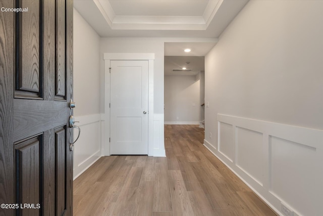 421 Parkside Commons, Bluffton, SC 29910 - hallway featuring a tray ceiling, light wood-style floors, and recessed lighting
