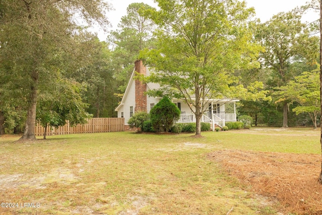 view of yard featuring a porch