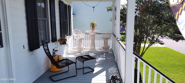 45 Holbrook Dr, Beaufort, SC 29902 - wooden deck featuring a lawn