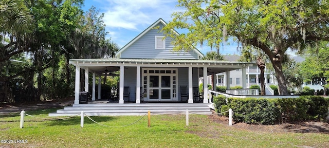 45 Holbrook Dr, Beaufort, SC 29902 - rear view of property featuring a porch and a lawn