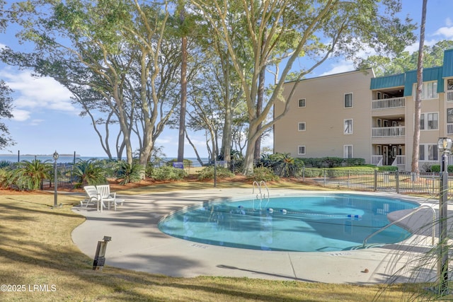 view of swimming pool with a patio area