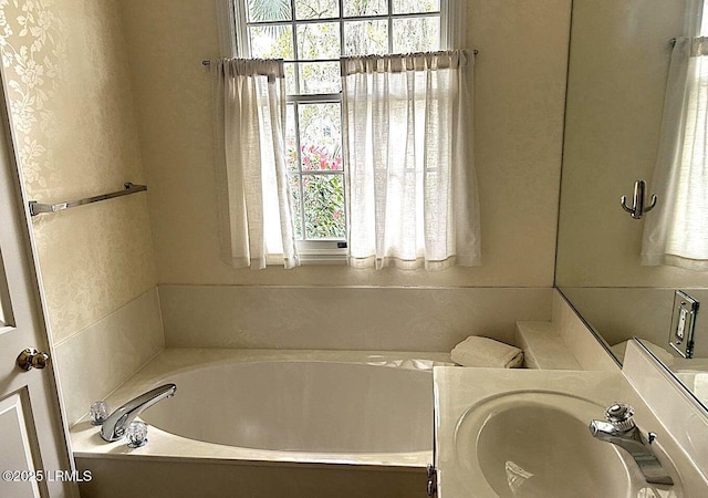 144 Locust Fence Rd, Saint Helena Island, SC 29920 - full bathroom featuring a sink, a wealth of natural light, and a bath