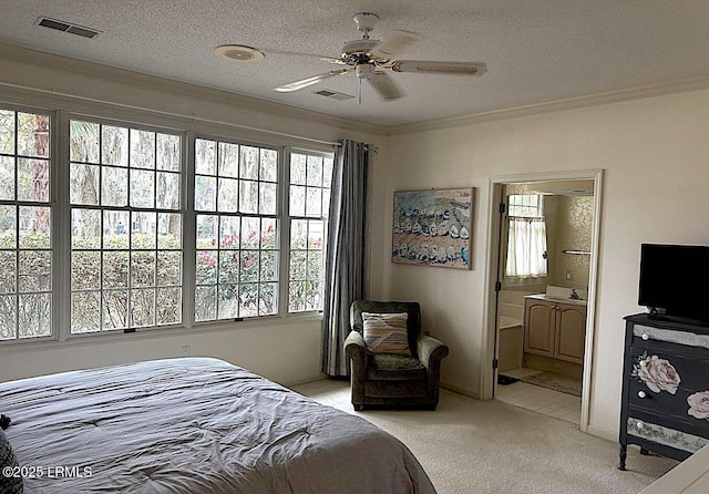 144 Locust Fence Rd, Saint Helena Island, SC 29920 - bedroom with visible vents, light colored carpet, crown molding, and a textured ceiling