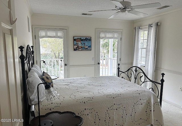 144 Locust Fence Rd, Saint Helena Island, SC 29920 - bedroom with visible vents, crown molding, and access to outside