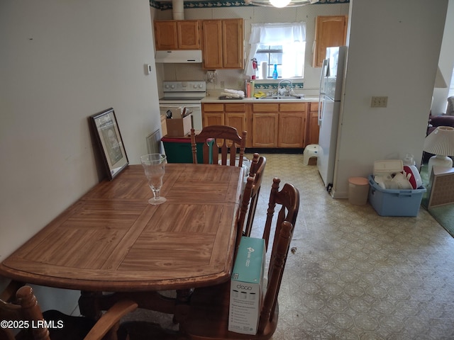 dining space with sink