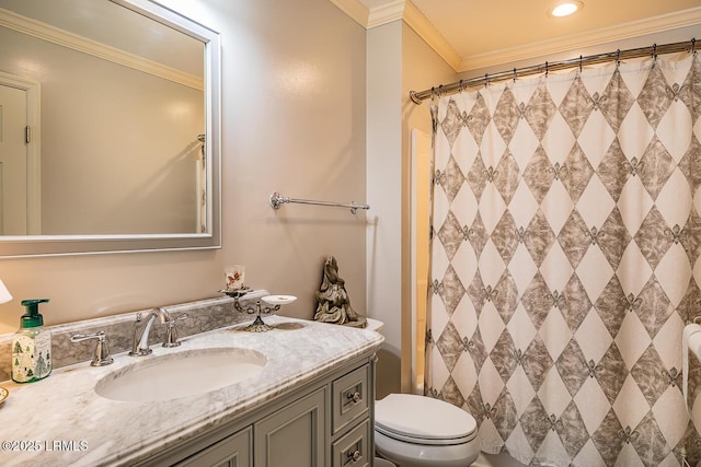 bathroom featuring crown molding, vanity, toilet, and walk in shower