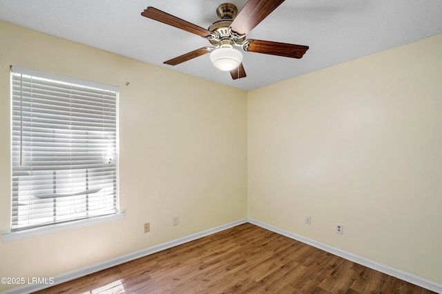 16 Star Magnolia Ct, Beaufort, SC 29907 - unfurnished room with wood finished floors, baseboards, and ceiling fan