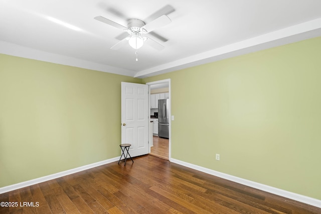 16 Star Magnolia Ct, Beaufort, SC 29907 - unfurnished room with dark wood-style floors, baseboards, and a ceiling fan