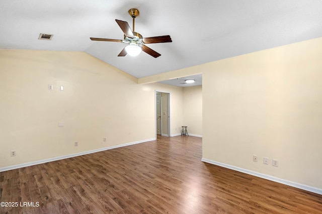 16 Star Magnolia Ct, Beaufort, SC 29907 - empty room featuring a ceiling fan, wood finished floors, baseboards, and vaulted ceiling