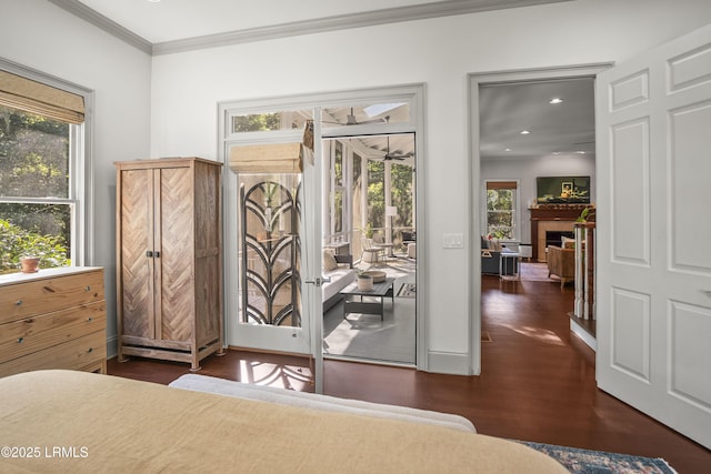 105 Bartram Dr, Beaufort, SC 29902 - bedroom featuring access to outside, wood finished floors, ornamental molding, recessed lighting, and a fireplace