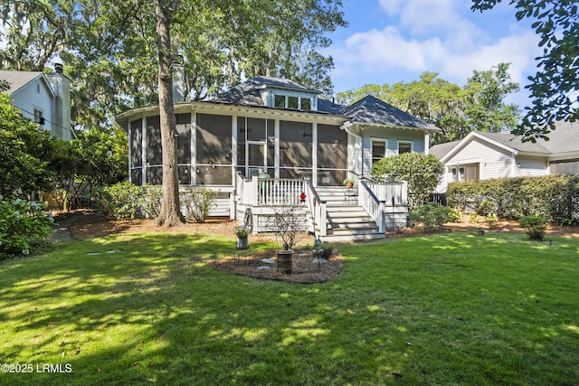105 Bartram Dr, Beaufort, SC 29902 - rear view of property featuring a sunroom, a yard, and stairs