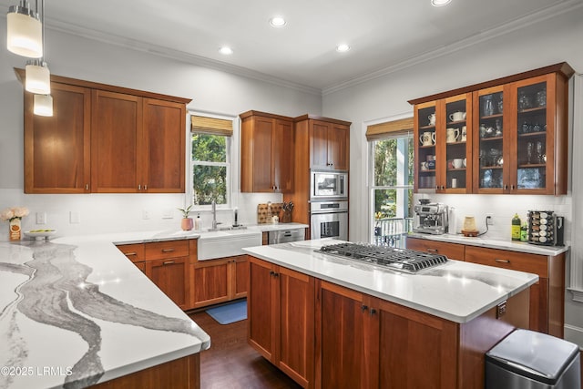 105 Bartram Dr, Beaufort, SC 29902 - kitchen with stainless steel appliances, a center island, recessed lighting, tasteful backsplash, and glass insert cabinets
