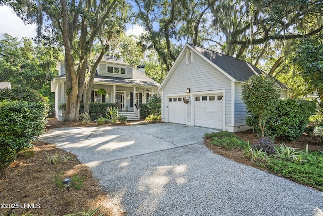 105 Bartram Dr, Beaufort, SC 29902 - view of front of property with an outbuilding, covered porch, driveway, and roof with shingles