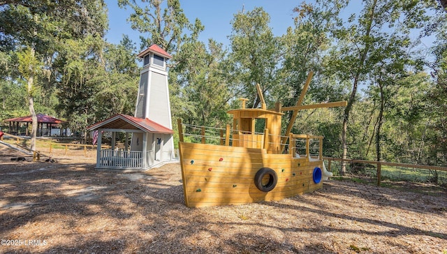 105 Bartram Dr, Beaufort, SC 29902 - view of outdoor structure featuring view of scattered trees and a playground