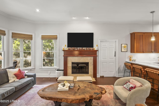 105 Bartram Dr, Beaufort, SC 29902 - living area featuring ornamental molding, a tile fireplace, dark wood-type flooring, and recessed lighting