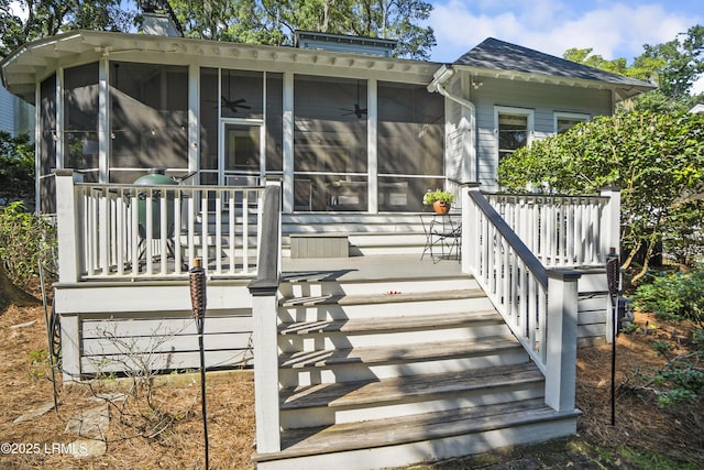 105 Bartram Dr, Beaufort, SC 29902 - wooden deck featuring a sunroom, stairway, and ceiling fan